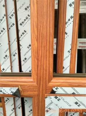 木纹彩铝门窗（木纹彩铝门窗效果图）-图2
